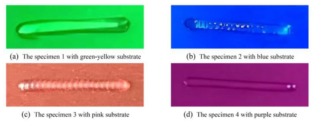 Four photographs of a straight transparent adhesive bead on green-yellow, blue, pink and purple substrates, labelled specimens 1 to 4.